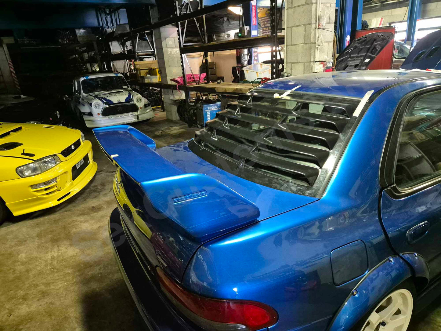 Subaru Impreza I Rear Window Louver